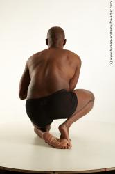 Kneeling reference poses of Arturo